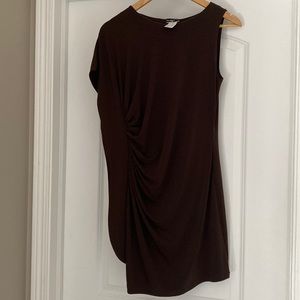 Never worn Rouched brown tunic. Purchased from boutique.